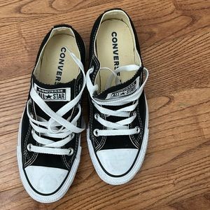 Converse All Star Black size 6 women’s or 4 men’s.
